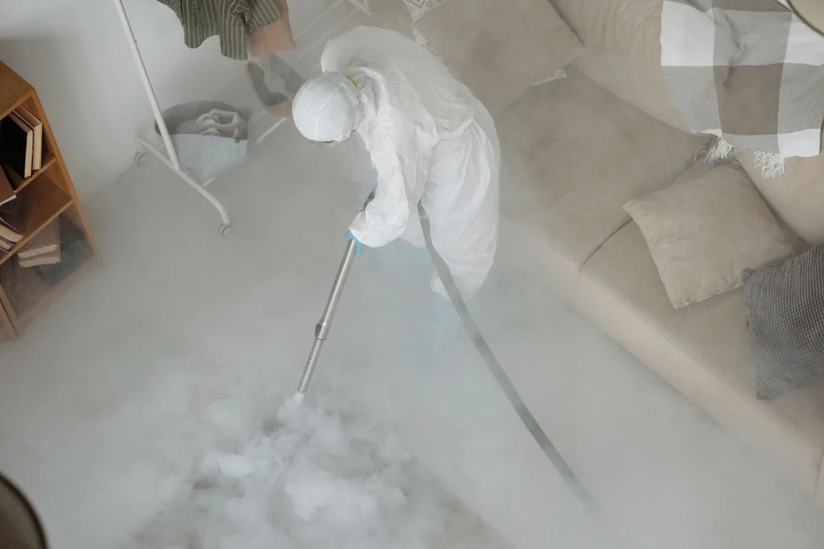 Biohazard cleanup technician in protective equipment, Manville, NJ
